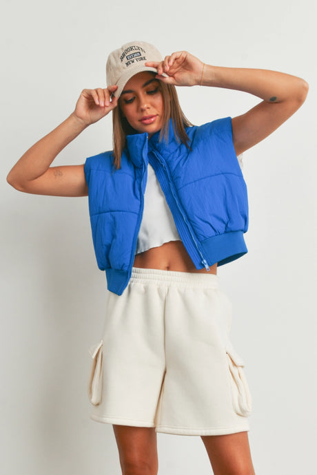 Saying Nothing More Crop Puffer Vest in Blue