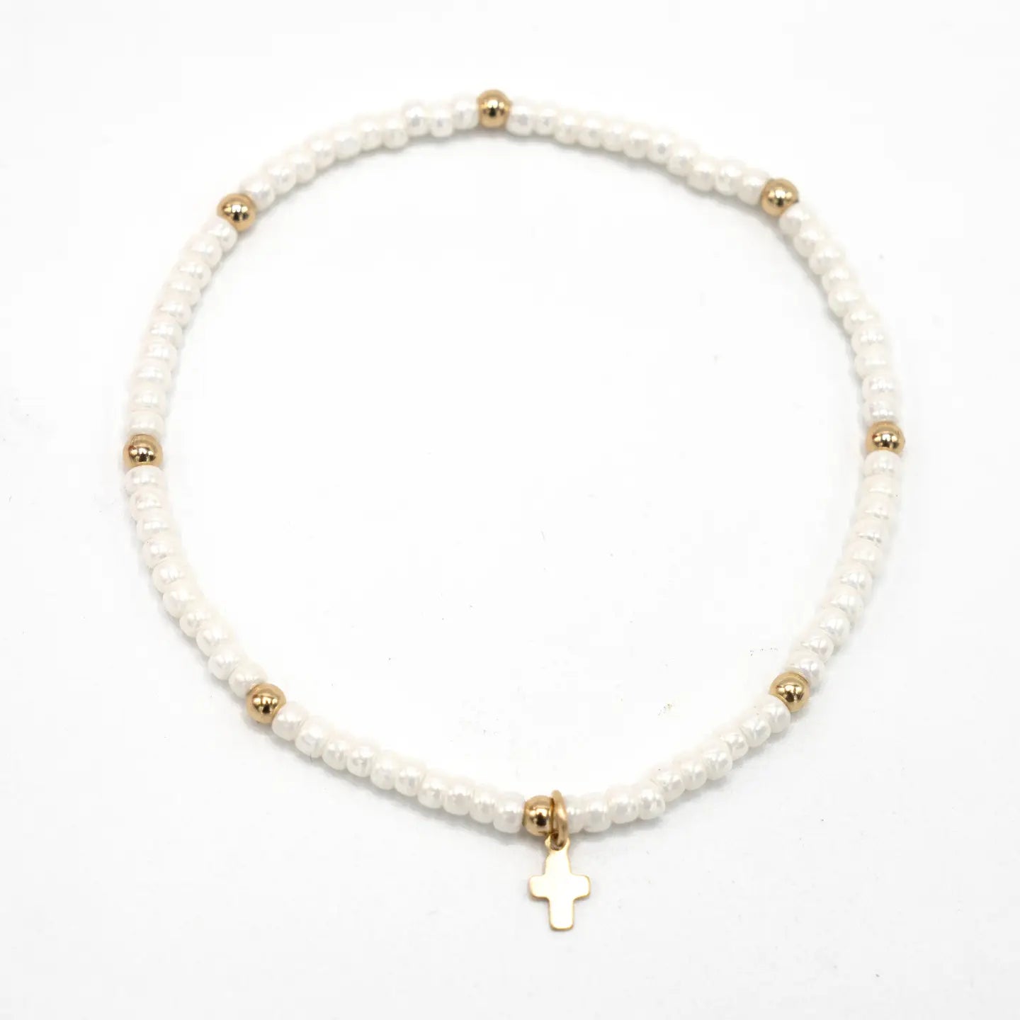 Erin Gray Luxe Cross Bracelet in Pearl White