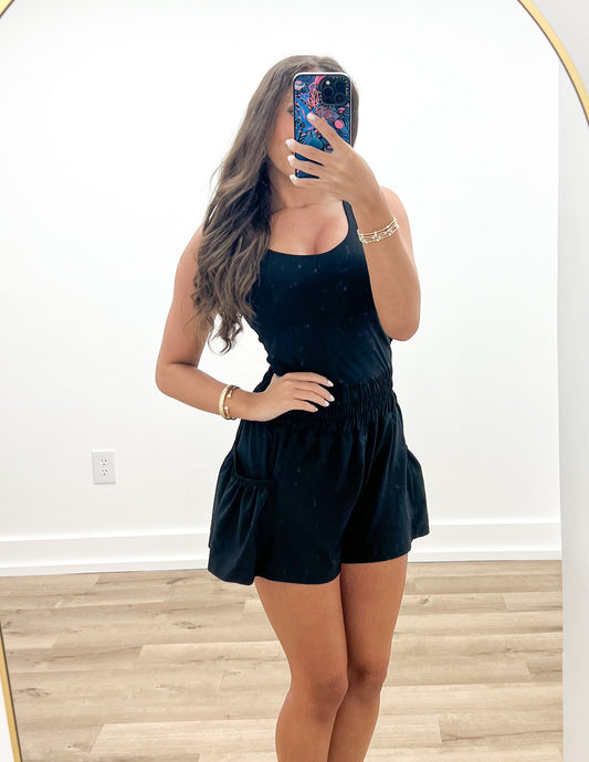 Flounce & Flow Romper in Black