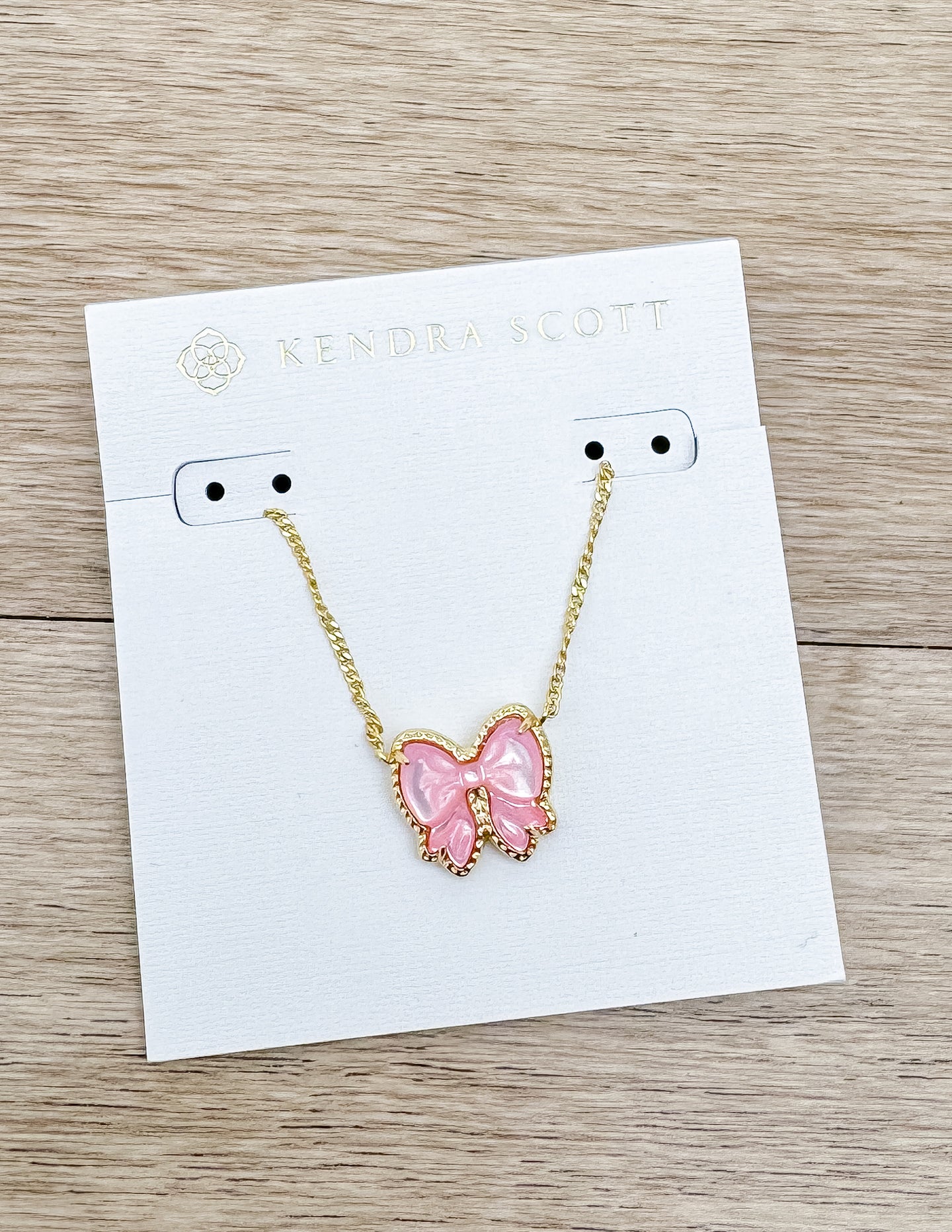 Kendra Scott Haley Bow Short Pendant Necklace in Gold/Blush MOP