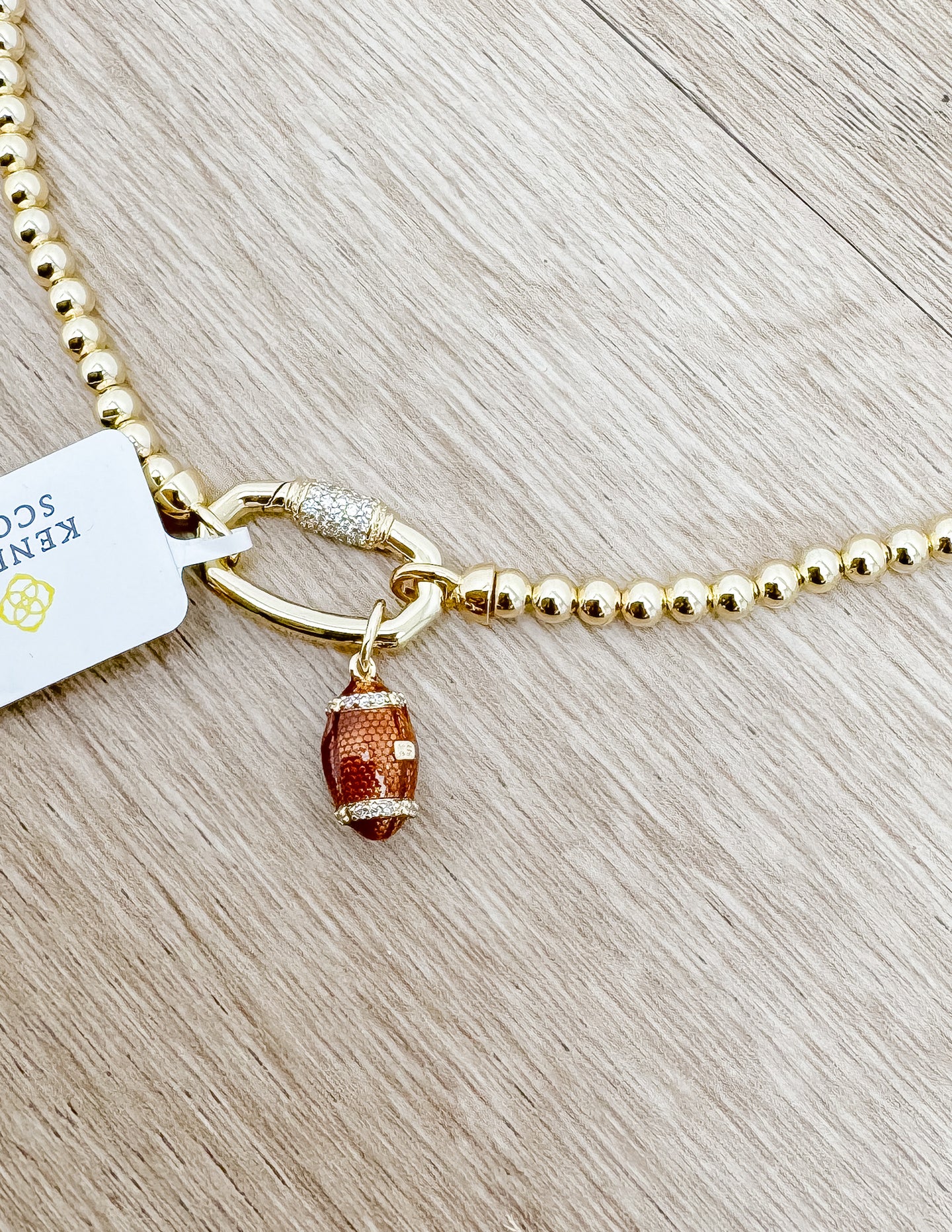 Kendra Scott Football Gold Metal Strand Necklace in White CZ